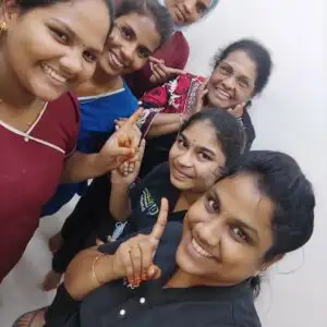 Grateful patient with smiling doctor and nurses